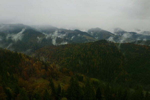 Aerial view of mountains covered with fog