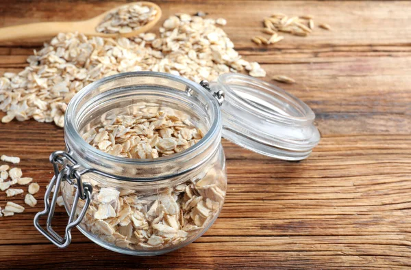 Tarro Vidrio Con Avena Sobre Mesa Madera Espacio Para Texto —  Fotos de Stock