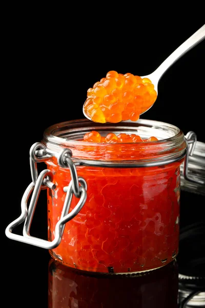 Glass Jar Spoon Delicious Red Caviar Black Background — Stock Photo, Image