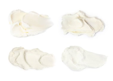 Beyaz arka planda taze krem peynir.