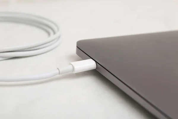 Charge Cable Connected Laptop Light Table Closeup — Stock Photo, Image