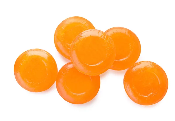 多くのオレンジ色の咳が白い背景に落ち トップビュー — ストック写真