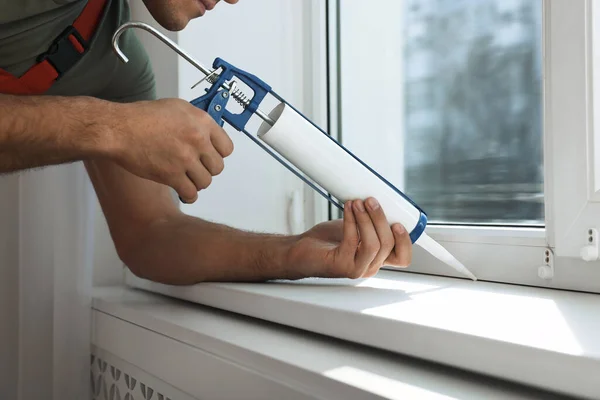 Construction Worker Sealing Window Caulk Indoors Closeup — Stock Photo, Image