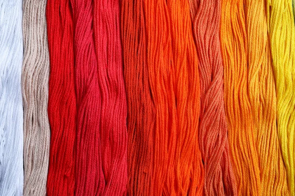 Different Colorful Embroidery Threads Background Top View — Stock Photo, Image