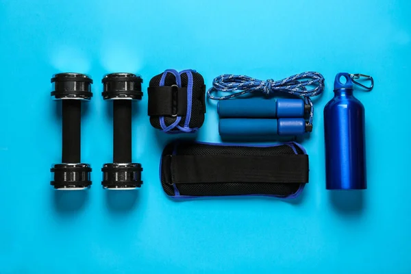 Weighting Agents Sport Equipment Light Blue Background Flat Lay — Stock Photo, Image