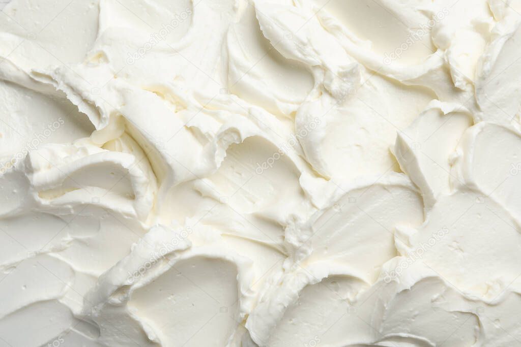 Closeup of tasty cream cheese as background, top view