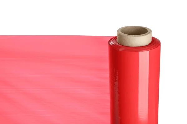 Roll of red plastic stretch wrap film isolated on white