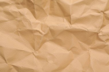 Arkaplan olarak kahverengi buruşuk kağıdın dokusu, yakın plan