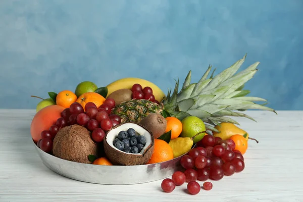 Assortment Fresh Exotic Fruits White Wooden Table Light Blue Background — Stock Photo, Image