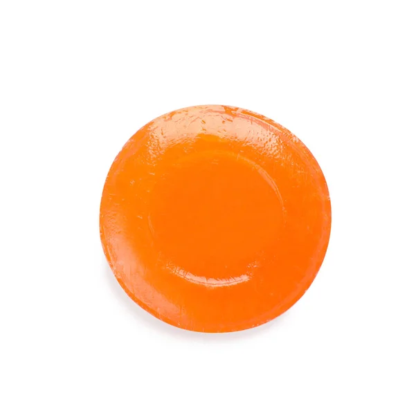 白で隔離された一つのオレンジ色の咳の落下トップビュー — ストック写真