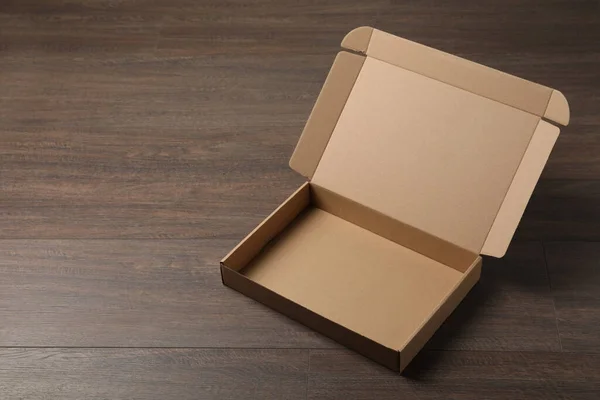 Empty Open Cardboard Box Wooden Table Space Text — Stock Photo, Image