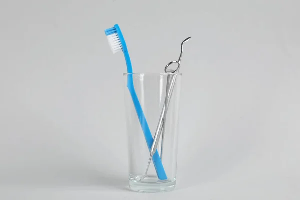 Glass Holder Toothbrush Dentist Tools Light Grey Background — Stock Photo, Image