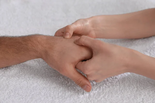 Man Receiving Hand Massage Soft Towel Closeup — Stock Photo, Image