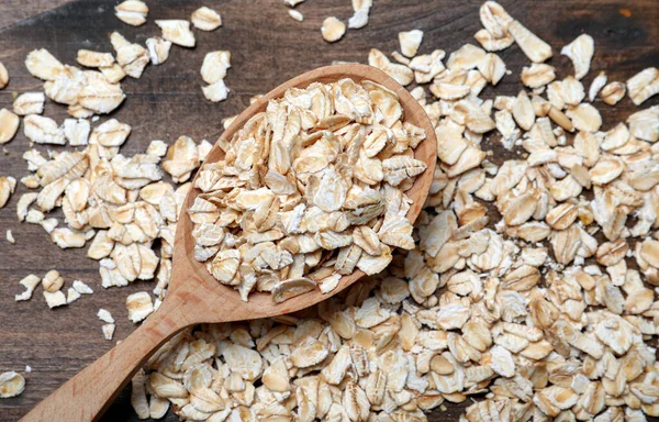 Cuchara Con Harina Avena Sobre Mesa Madera Puesta Plana —  Fotos de Stock