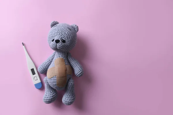 Toy Bear Medical Plasters Thermometer Pink Background Flat Lay Space — Stock Photo, Image