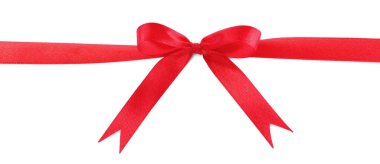 Beyaz arka planda fiyonklu kırmızı saten kurdele, üst görünüm