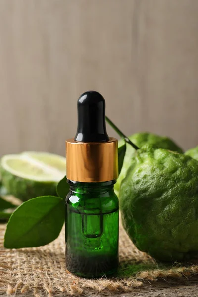 Bottle Essential Oil Fresh Bergamot Fruits Table — Stock Photo, Image