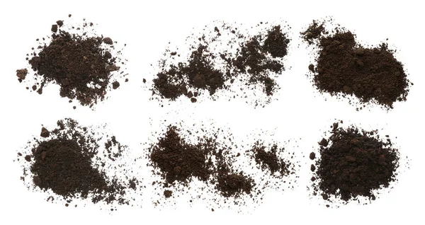 Комплект Грудами Плодородной Почвы Белом Фоне Вид Сверху — стоковое фото