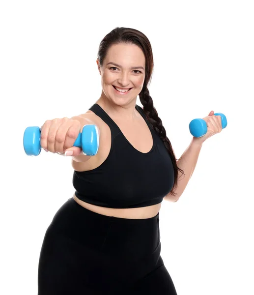 幸せな太りすぎ女性あります演習とともにダンベル上の白い背景 — ストック写真