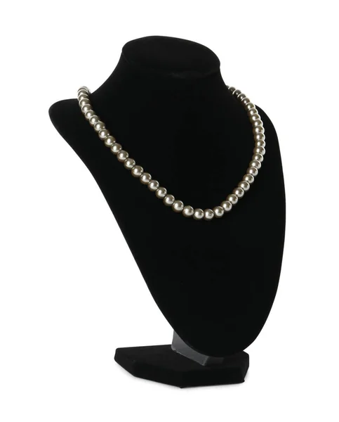 ホワイトを背景にジュエリーバスト上のスタイリッシュな真珠のネックレス — ストック写真