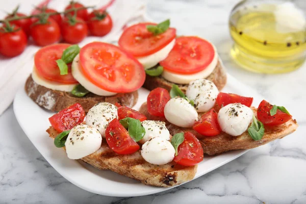 Delicious Sandwiches Mozzarella Fresh Tomatoes Basil White Marble Table — Stock Photo, Image