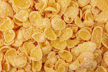 Tatlı mısır gevrekleri arka planda, üst manzara