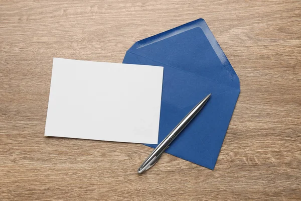 Blue Envelope Blank Letter Pen Wooden Table Flat Lay — Stock Photo, Image