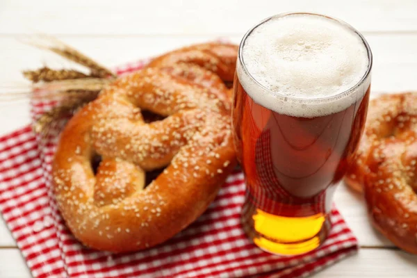 Glass Beer Tasty Freshly Baked Pretzels White Wooden Table Closeup — Stock Photo, Image