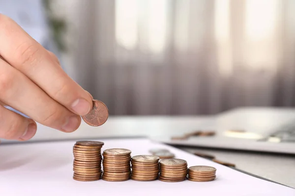 Man Stacking Coins Table Indoors Closeup — Stock Photo, Image