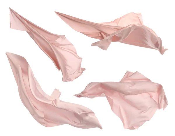白い背景に浮かぶ美しい繊細な淡いピンクのシルクとセット — ストック写真