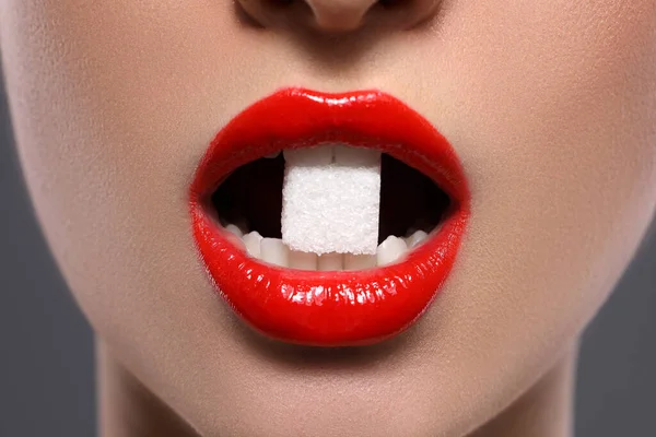 Closeup View Young Beautiful Lips Eating Sugar Cube Grey Background — Stock Photo, Image