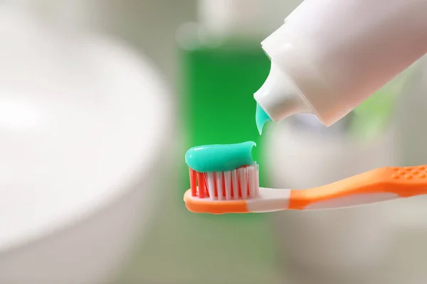 Applying Toothpaste Brush Blurred Background Closeup — Stock Photo, Image