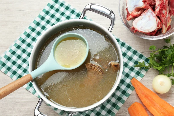 Delicious Homemade Bone Broth Ingredients White Wooden Table Flat Lay — Stock Photo, Image