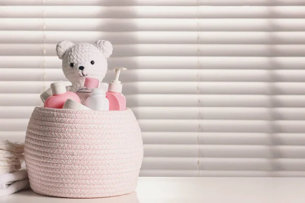 Wicker Basket Baby Cosmetic Products Knitted Toy Bear White Table — Stock Photo, Image