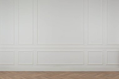 Odada beyaz bir duvar var. Tasarım için boşluk