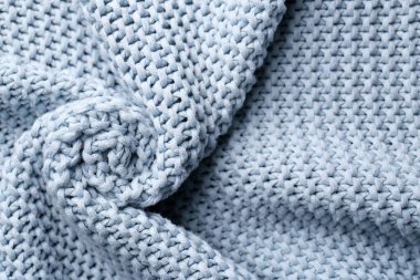 Arka plan olarak güzel açık mavi örgü kumaş, üst görünüm