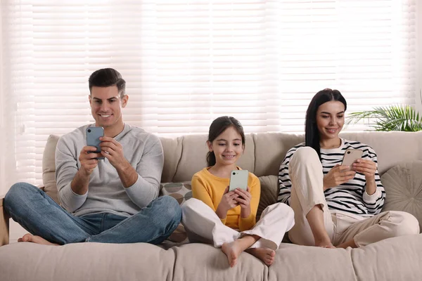 Internet Addiction Family Different Gadgets Living Room — Stock Photo © NewAfrica #554480114