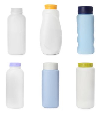 Beyaz arka planda bebek pudrası şişeleri.