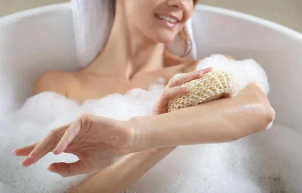 Woman Rubbing Her Arm Sponge While Taking Bath Closeup — Stock Photo, Image