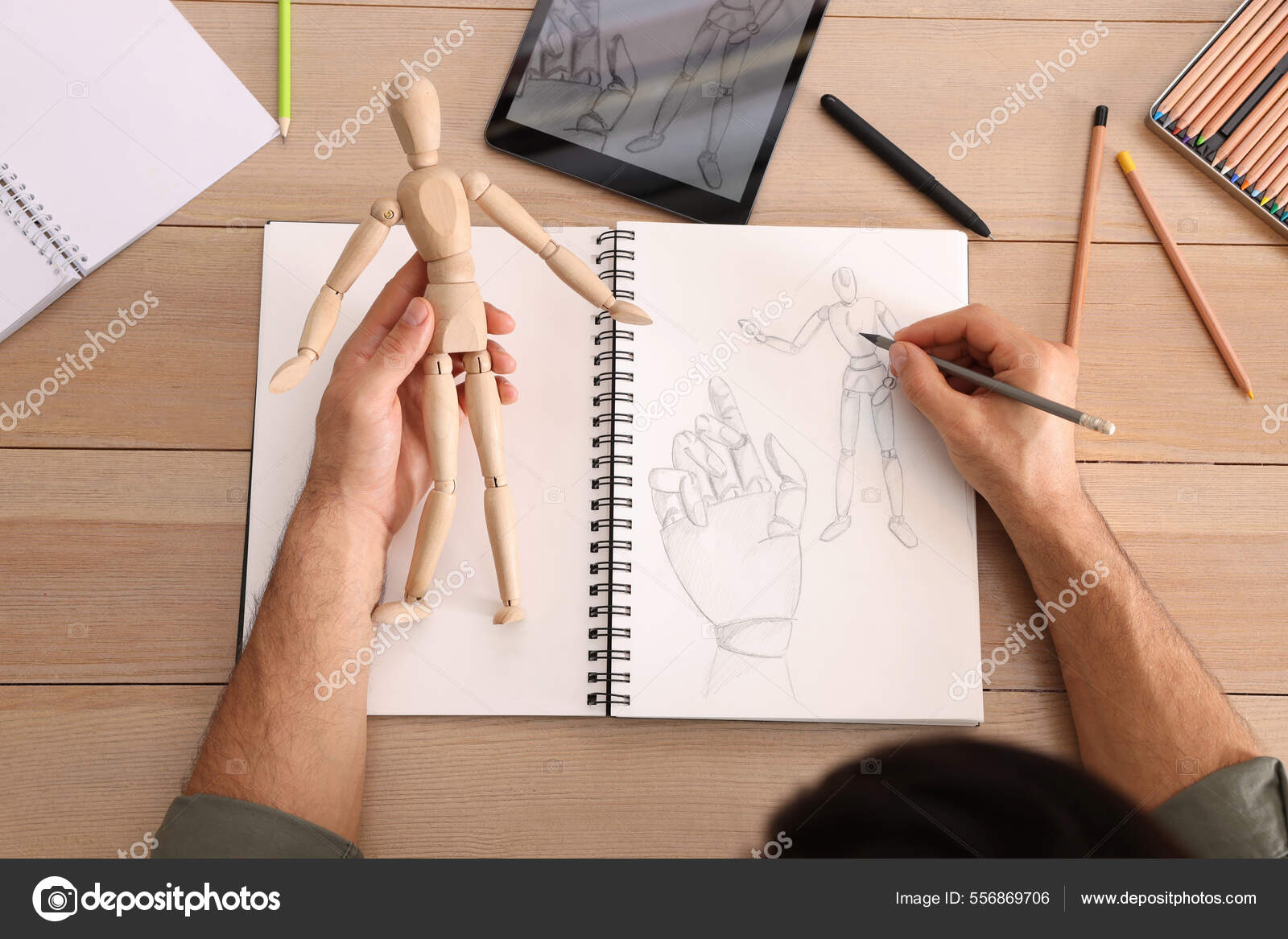 Man Drawing Mannequin Sketchbook Pencil Wooden Table Top View Stock Photo  by ©NewAfrica 556869706