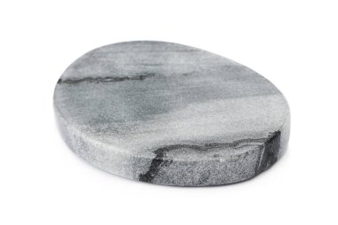 Beyaz arka planda şık bir bardak altlığı.