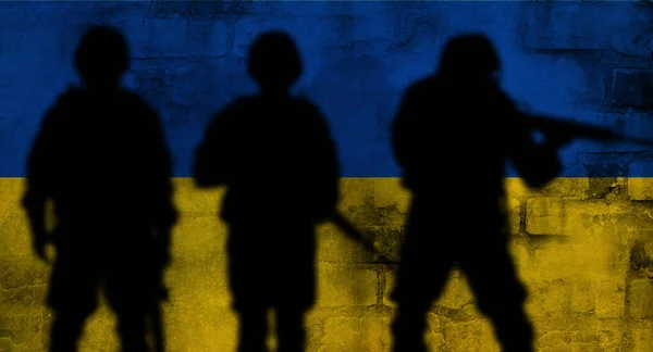 Silhouettes Soldiers Wall Painted Ukrainian Flag Colors Background Military Service — Stock Photo, Image