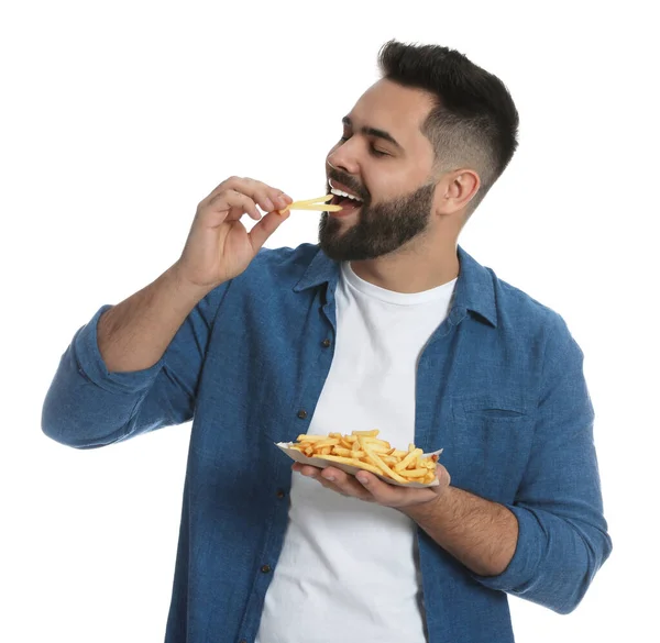 Jeune Homme Mangeant Des Frites Sur Fond Blanc — Photo