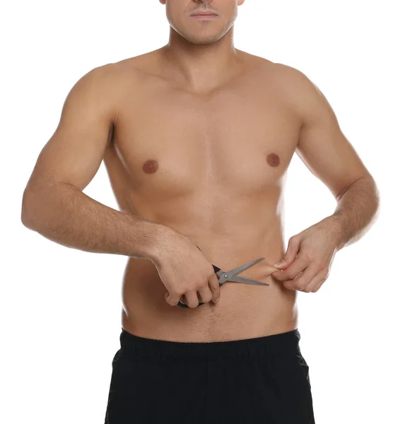 配上白色背景剪子的男人 体重减轻手术 — 图库照片