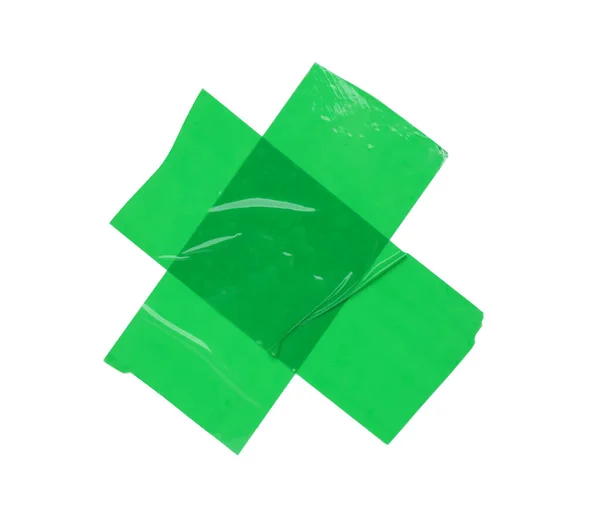 白色背景的横切绿色胶粘带 顶部视图 — 图库照片