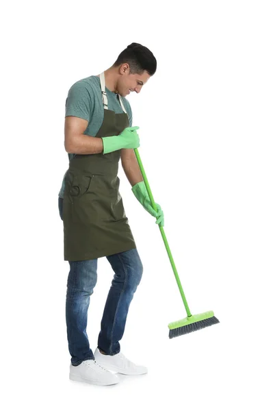 Hombre Con Escoba Verde Sobre Fondo Blanco — Foto de Stock