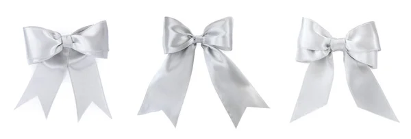 用漂亮的银丝带系在白色背景的蝴蝶结上 条幅设计 — 图库照片