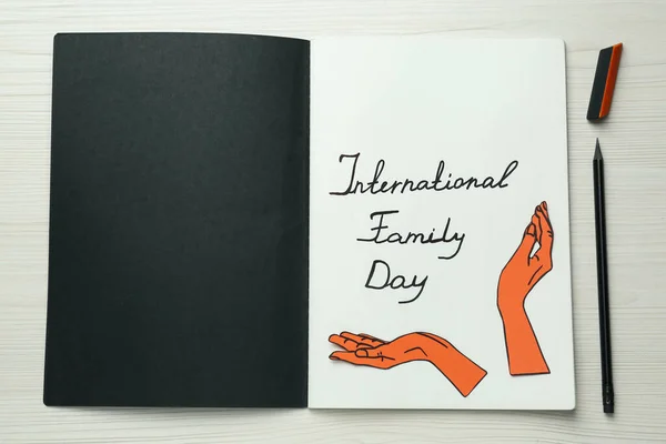 Happy Family Day Notebook Written Phrase Paper Hands Cutout Stationery — Fotografia de Stock