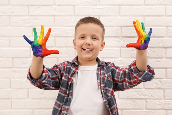 Happy Little Boy Showing Painted Palms White Brick Wall — ストック写真