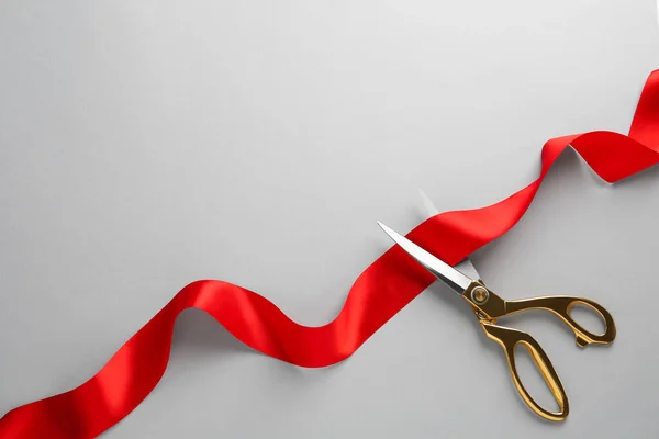 Red Ribbon Scissors Light Grey Background Top View Space Text — Photo